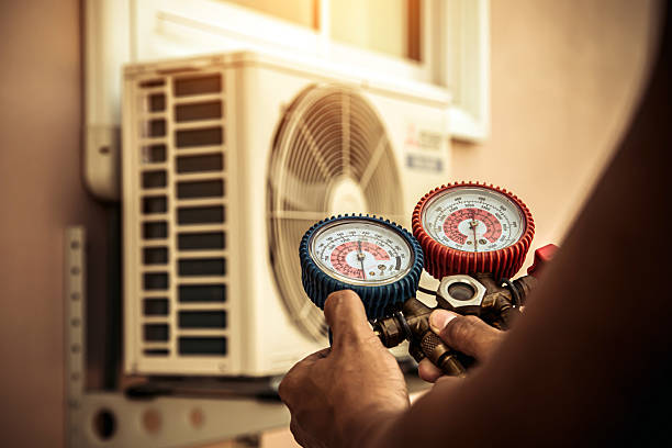 Professional Ductwork Repair technician working in Walls, MS